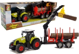 Traktorius su miško priekaba, rąstais ir pasukamu kranu