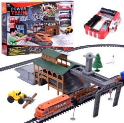 Remote-controlled freight train track set with cars and a loading/unloading station