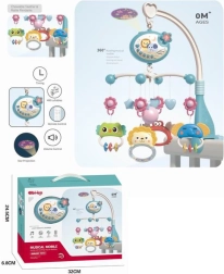 Mėlynas karuselė virš lovytės su gyvūnėliais