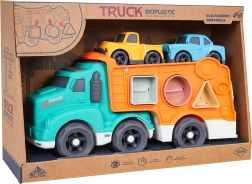 Ekologiškas vilkikas su formų rūšiuokliu ir mašinėlėmis