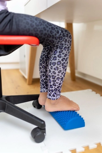Ergonomiška pakoja prie darbo stalo