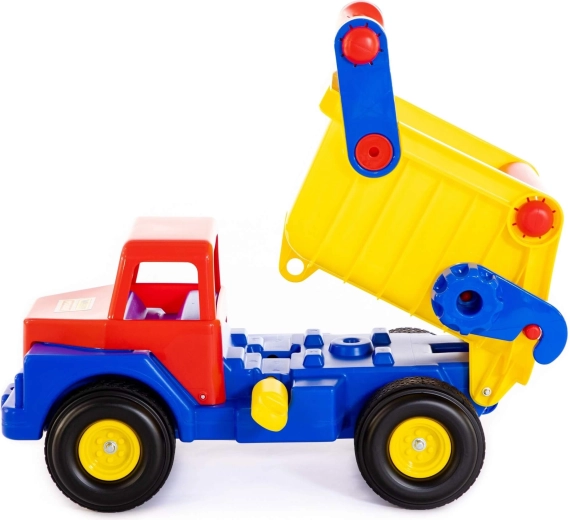 Tilting bed for realistic unloading