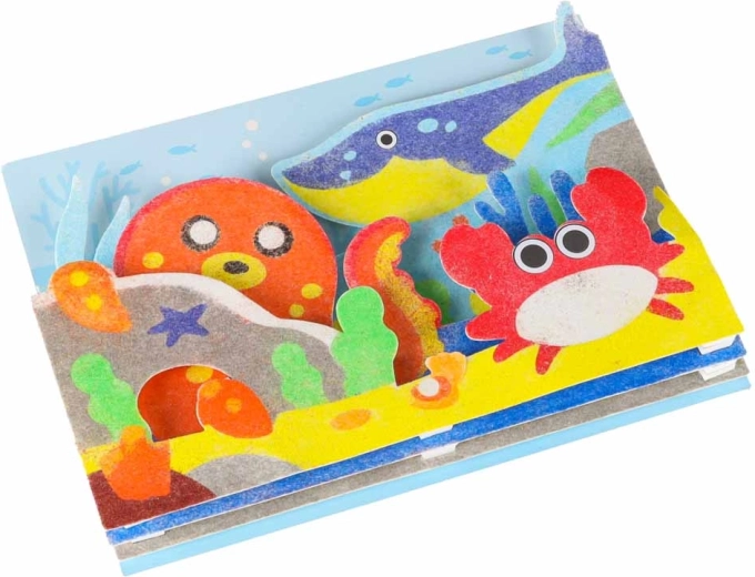 Colored sand and sea animal motifs