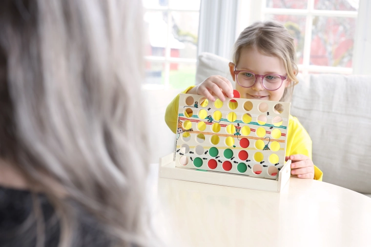 Develops motor skills and concentration through play