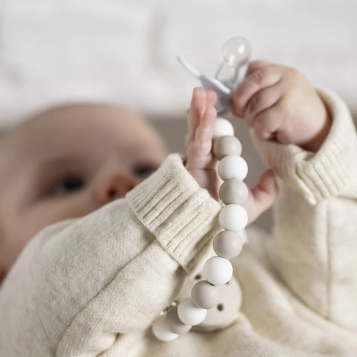 Safe and practical attachment to clothing