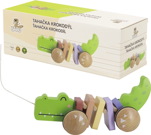 Babu traukiamas medinis krokodilas ant virvelės