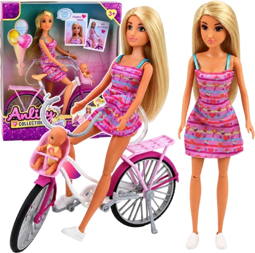 Anlily doll in a pink dress with a bicycle, child seat and baby doll