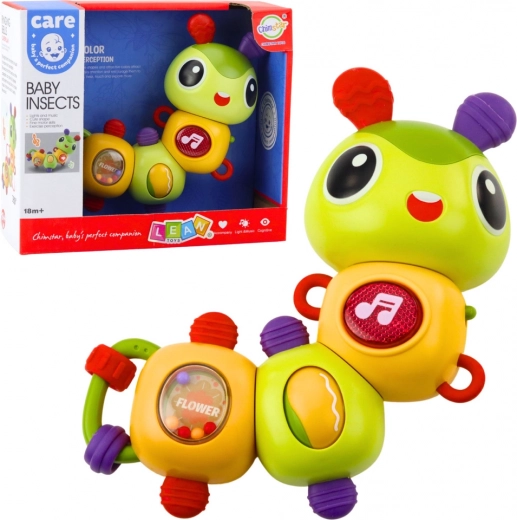 Interaktyvus sensorinis vikšrelis – muzikinis barškutis ir kramtukas su 360° besisukančiais elementais