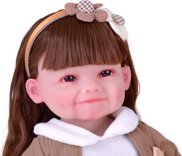 Realistiška išvaizda ir miela šypsena