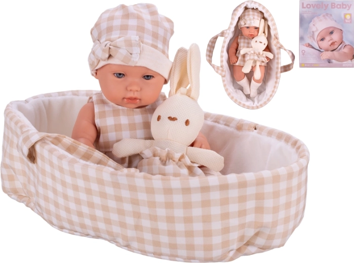 Lėlė 33 cm su kietu kūneliu, nešyne ir pliušiniu zuikučiu