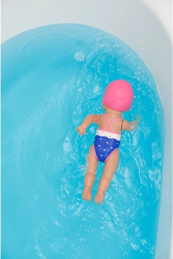 Swims across the surface by herself
