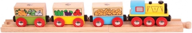 Bigjigs Rail freight train with vegetables and tracks