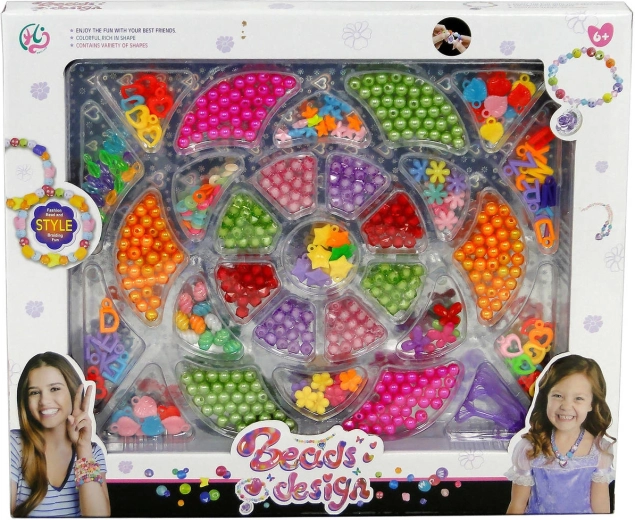 Threading beads with charms – creative set for making children’s jewelry