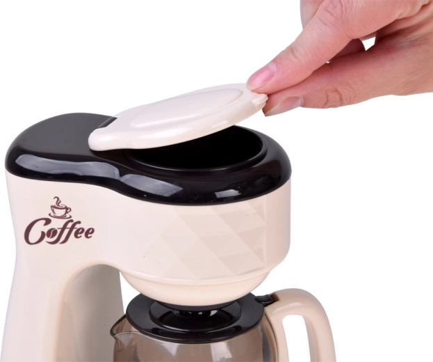 Opening lid and removable carafe