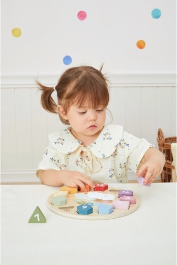 Developing fine motor skills through play