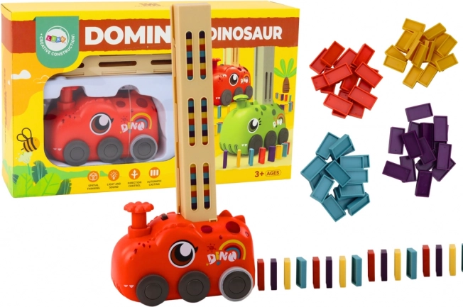 Raudonas baterijomis maitinamas dinozaurų traukinukas, statantis spalvotą domino
