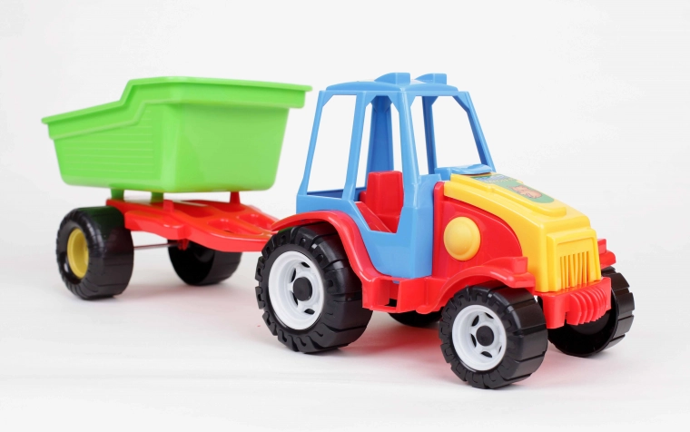 Plastic tractor with tipping trailer for children