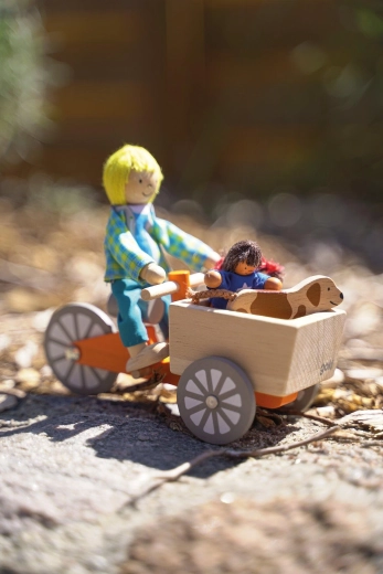 Wooden cargo bike with 2 flexible dolls and a dog