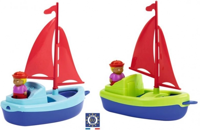 Plastic sailboat for water with sailor 22.5 cm