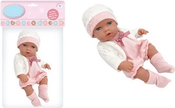 Baby doll in pink and white clothing