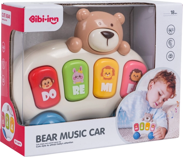 Children's Piano with a Teddy Bear