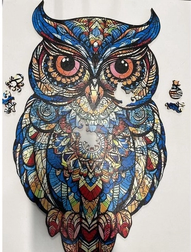 Meniškas pelėdos motyvas džiaugsmui ir dekorui