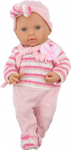 Stylish pink outfit with cardigan, bonnet, and scarf