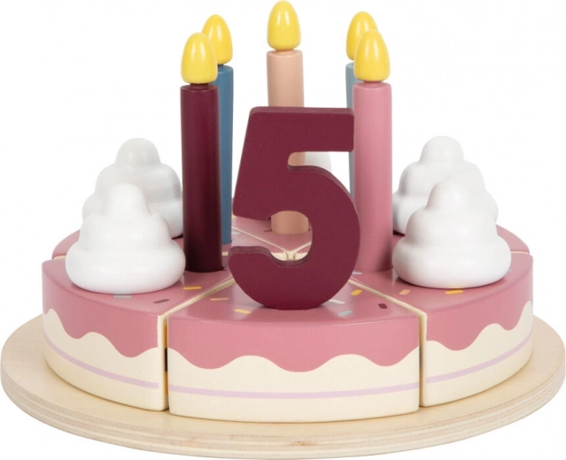 Decorating with candles, cream, and numbers 1–5
