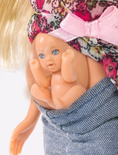 Atidaromas pilvukas ir kūdikėlis viduje