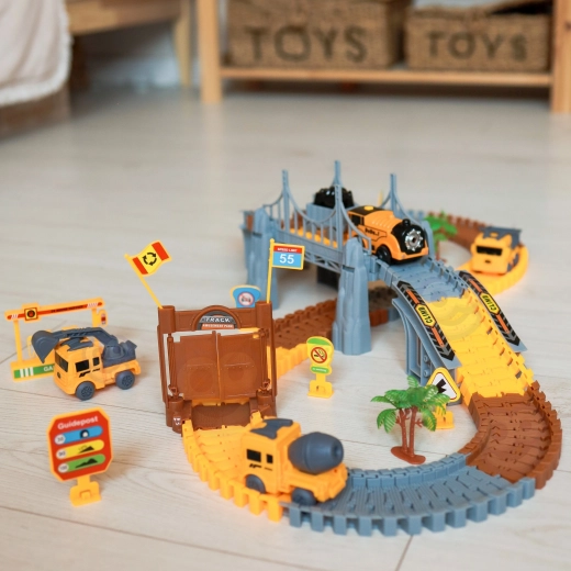 Lokomotyvas su pavara ir mini statybinės mašinos