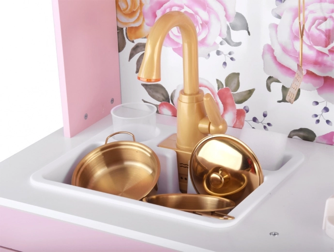Working sink with gold faucet