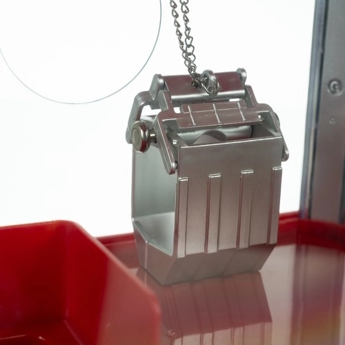 Metalinį griebtuvą ir apšviestą laimėjimo angą