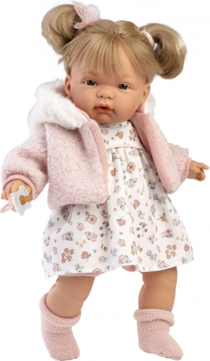 Talks and cries; the magnetic pacifier soothes her