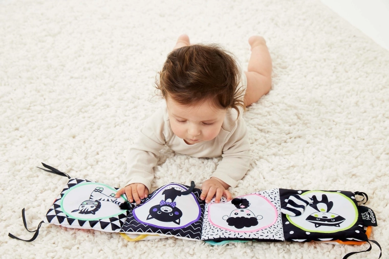 Tvirtinimas prie lovytės arba vežimėlio