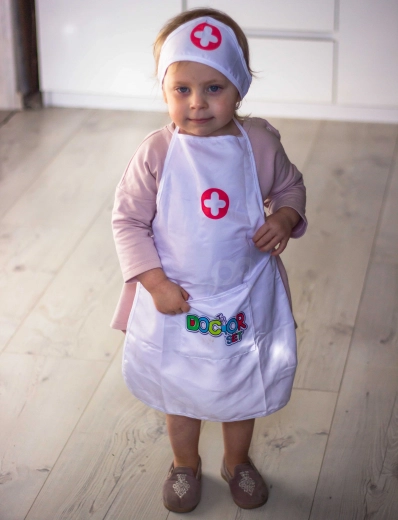 Reguliuojama kepuraitė su lipnia juostele